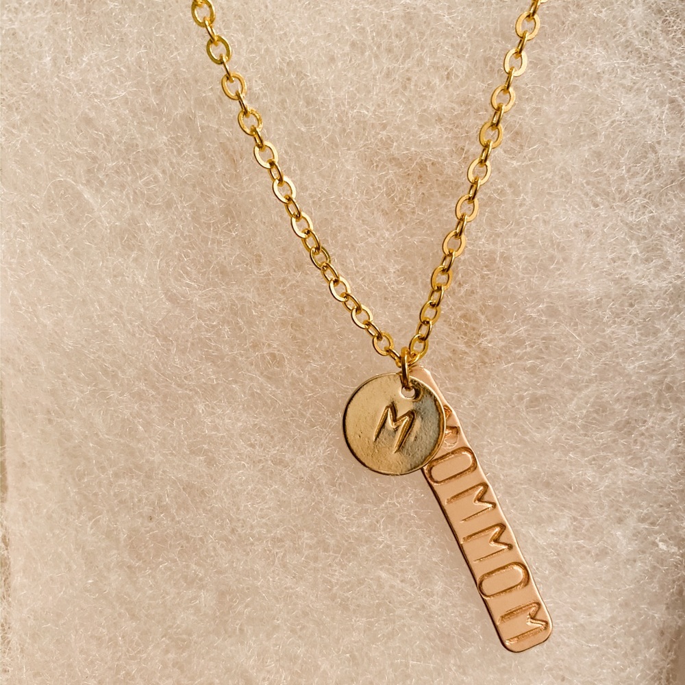 Handmade necklace with initial and “Mommom”
